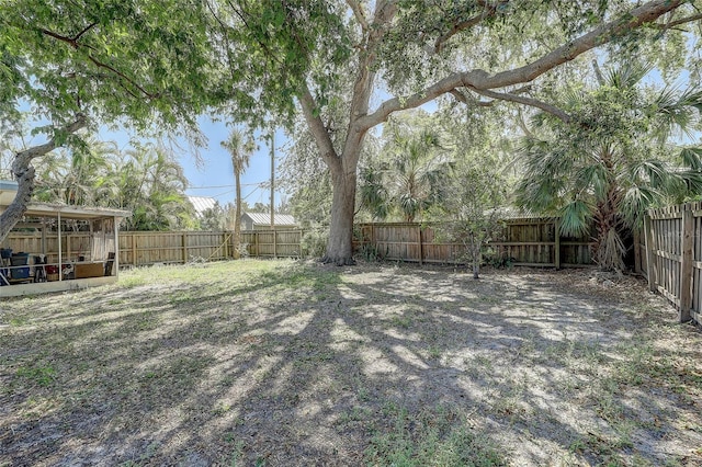 view of yard featuring a fenced backyard
