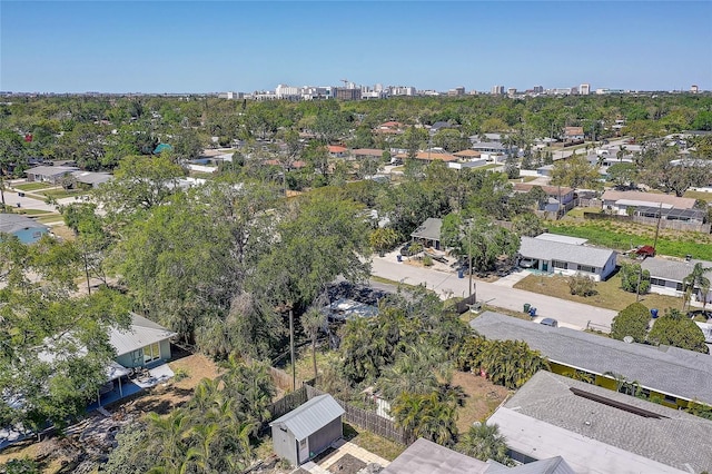 birds eye view of property with a residential view