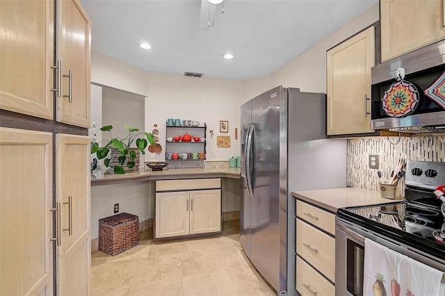 kitchen with light countertops, visible vents, decorative backsplash, appliances with stainless steel finishes, and light brown cabinets