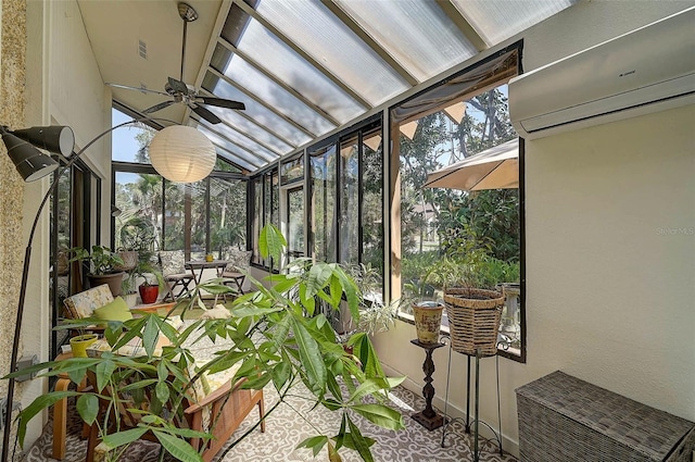 sunroom featuring a wall mounted air conditioner and ceiling fan