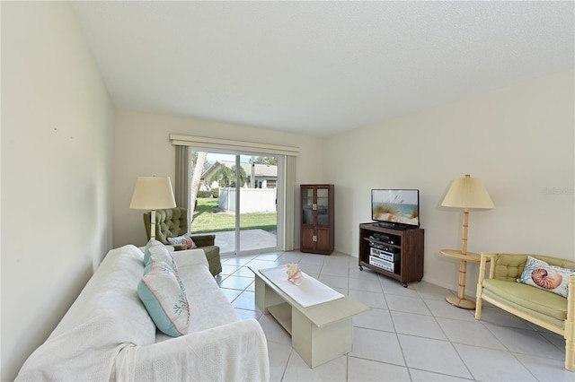 living area featuring light tile patterned floors