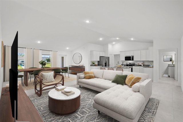 living room featuring recessed lighting, high vaulted ceiling, and light tile patterned floors