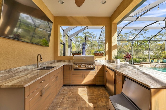 view of patio / terrace featuring an outdoor pool, an outdoor kitchen, glass enclosure, grilling area, and a sink