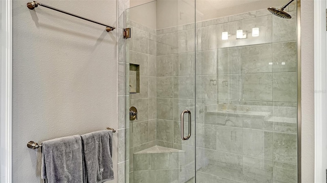 bathroom featuring a stall shower