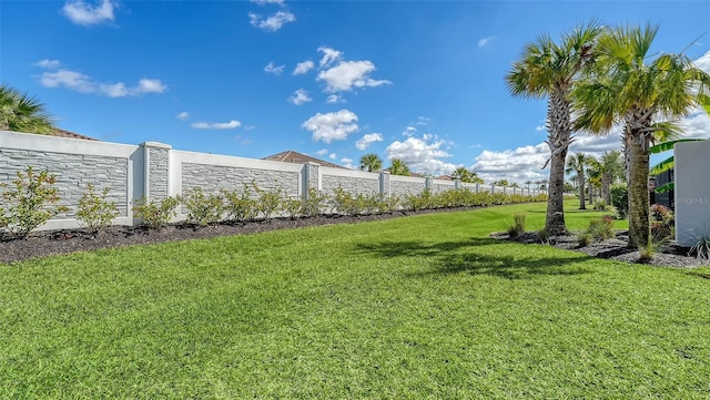 view of yard with fence