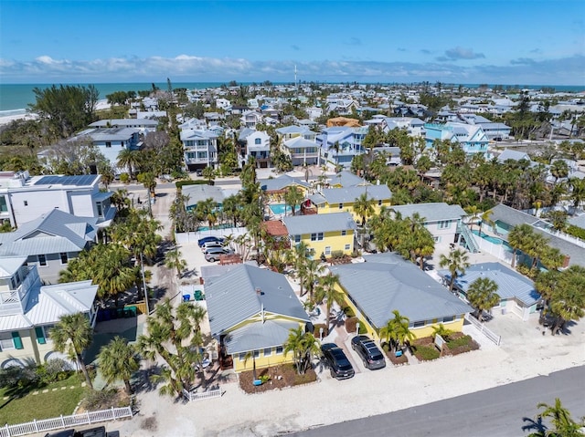 bird's eye view featuring a residential view and a water view