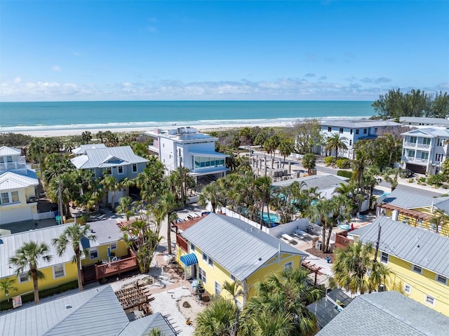 aerial view featuring a beach view and a water view