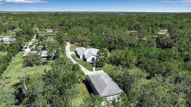 aerial view featuring a forest view