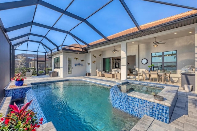 view of pool featuring ceiling fan, a patio, glass enclosure, and an outdoor living space