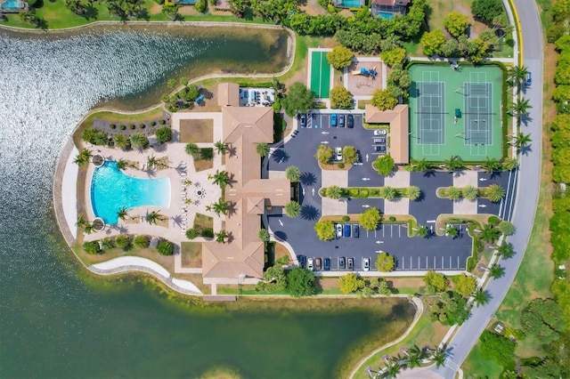 birds eye view of property featuring a water view