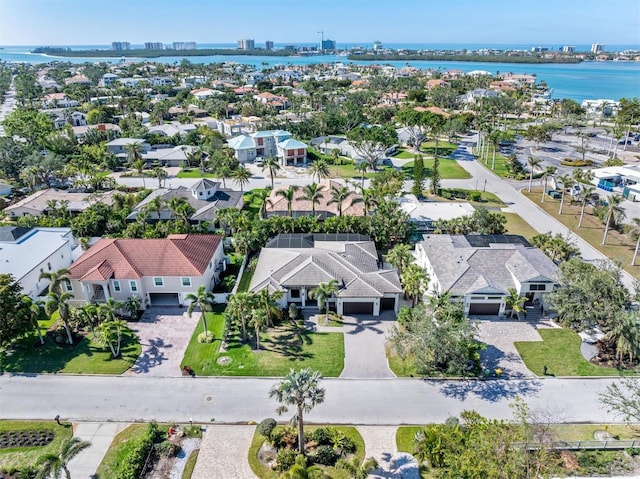 aerial view with a water view and a residential view