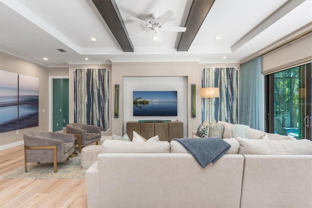 living area featuring light wood finished floors, crown molding, beam ceiling, and recessed lighting