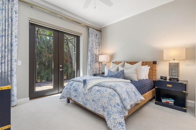 carpeted bedroom with ceiling fan, access to outside, french doors, and baseboards