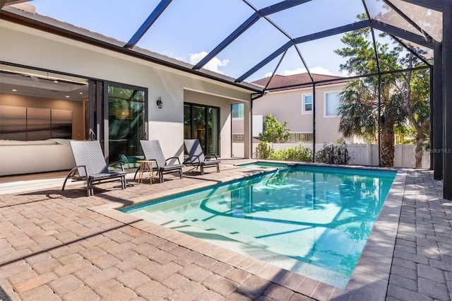 view of pool with a fenced in pool, a patio area, and fence