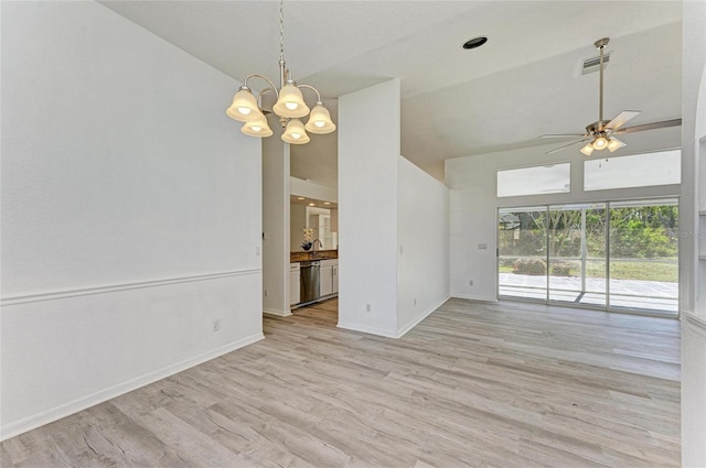 empty room featuring visible vents, light wood-style floors, high vaulted ceiling, baseboards, and ceiling fan with notable chandelier