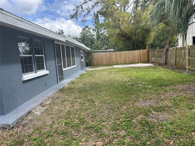 view of yard featuring a fenced backyard