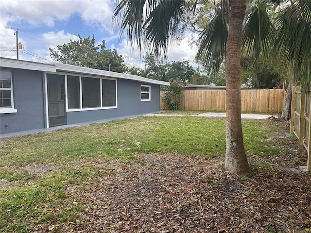 view of yard featuring a fenced backyard