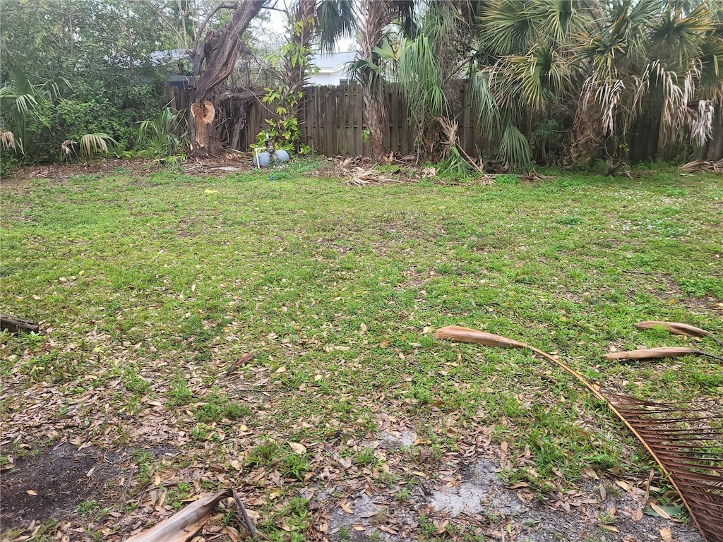 view of yard featuring fence