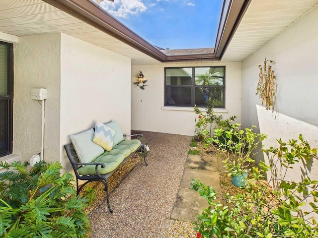 property entrance featuring stucco siding