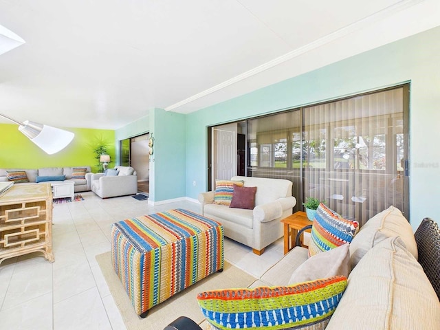 tiled living area featuring baseboards