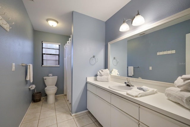 full bath with tile patterned flooring, toilet, vanity, and baseboards