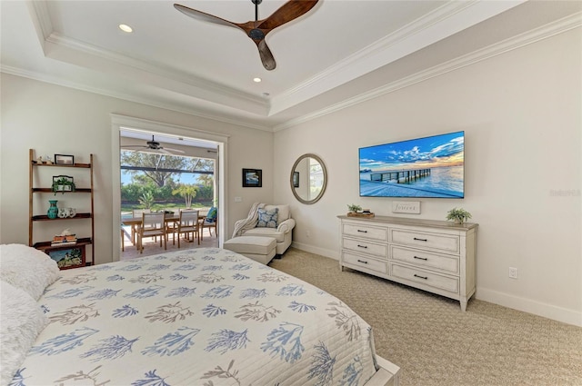 bedroom with light carpet, access to outside, a raised ceiling, and baseboards