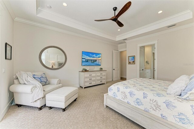 bedroom featuring recessed lighting, light carpet, visible vents, a tray ceiling, and crown molding