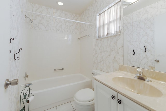 bathroom featuring toilet, wallpapered walls, shower / washtub combination, and vanity