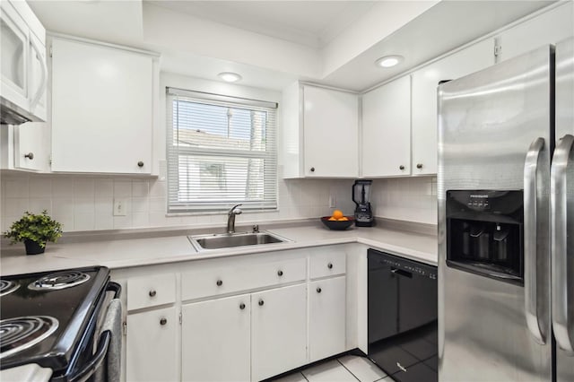 kitchen featuring white microwave, stainless steel fridge with ice dispenser, dishwasher, decorative backsplash, and a sink