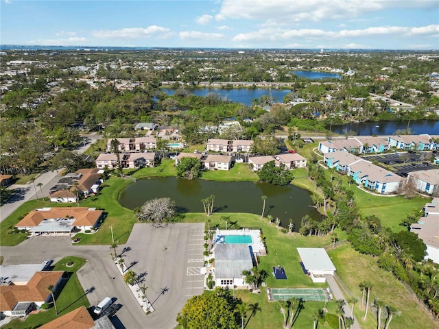 bird's eye view with a water view and a residential view