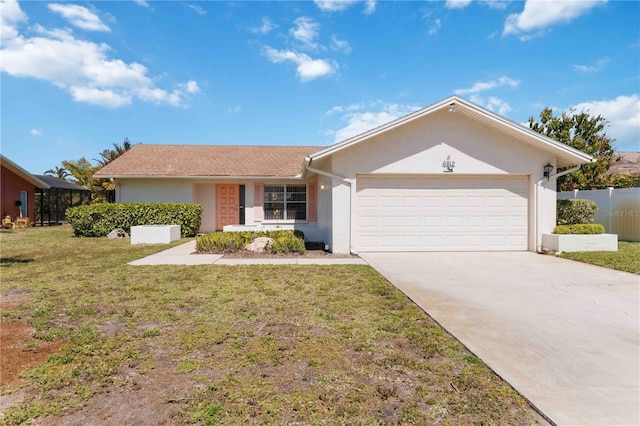 ranch-style home featuring fence, driveway, stucco siding, a front lawn, and a garage