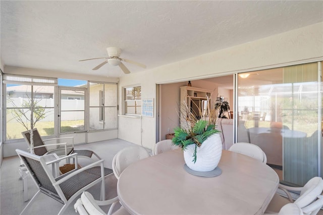 sunroom / solarium with ceiling fan