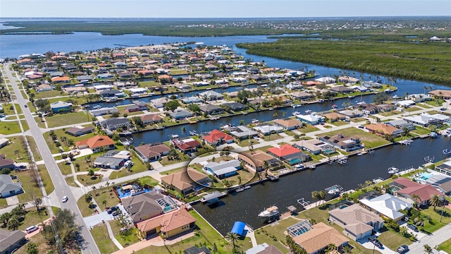 aerial view featuring a residential view and a water view