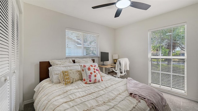 bedroom featuring ceiling fan and carpet floors