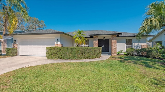 ranch-style house with a garage, concrete driveway, a front lawn, and stucco siding