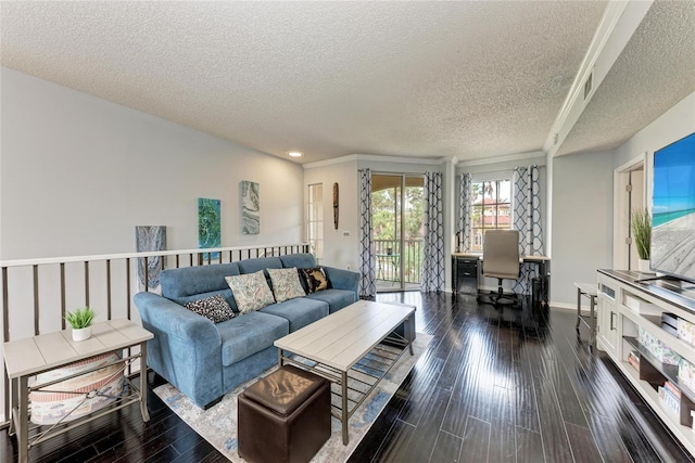 living room with a textured ceiling, dark wood-style flooring, and baseboards