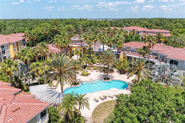 drone / aerial view with a view of trees