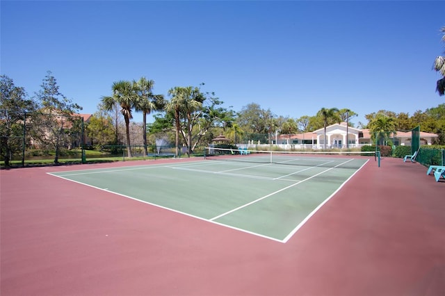 view of sport court with community basketball court and fence