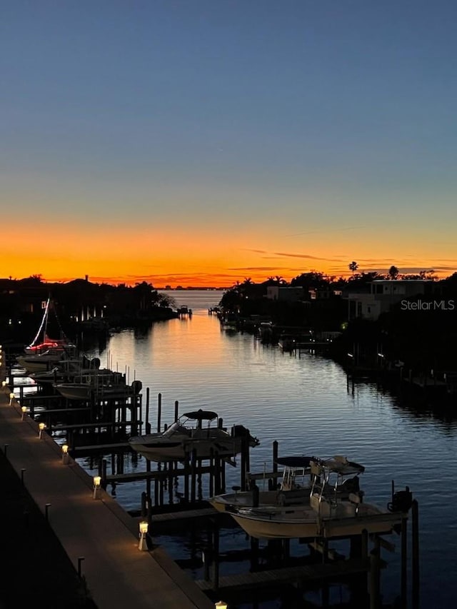 dock area featuring a water view and boat lift