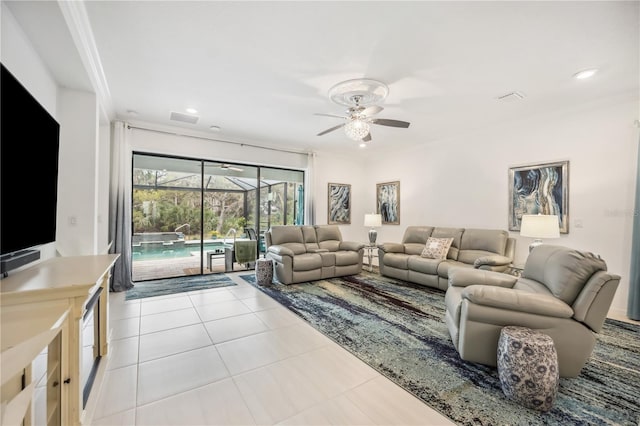 living room with light tile patterned floors, visible vents, a sunroom, ceiling fan, and recessed lighting