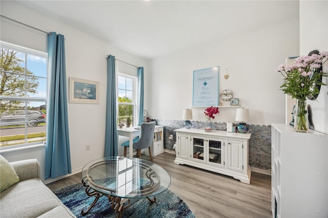 sitting room with light wood-style flooring