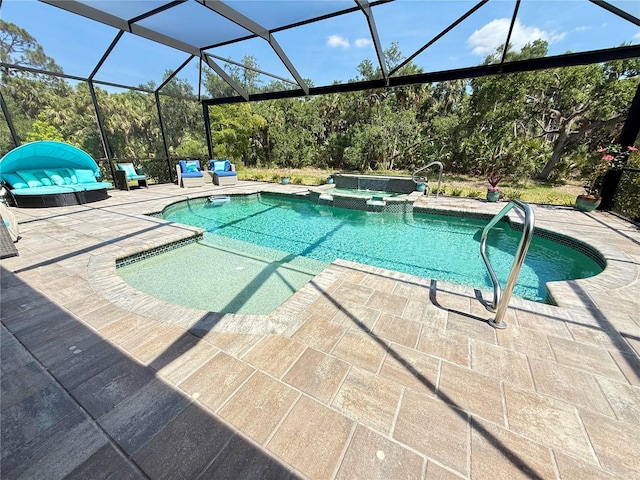 10179 Milky Way Cir, Sarasota, FL 34241 - view of swimming pool with glass enclosure, a patio, and a pool with connected hot tub