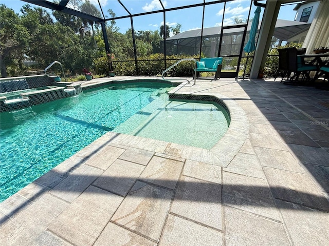 10179 Milky Way Cir, Sarasota, FL 34241 - view of pool featuring a patio, glass enclosure, and a pool with connected hot tub