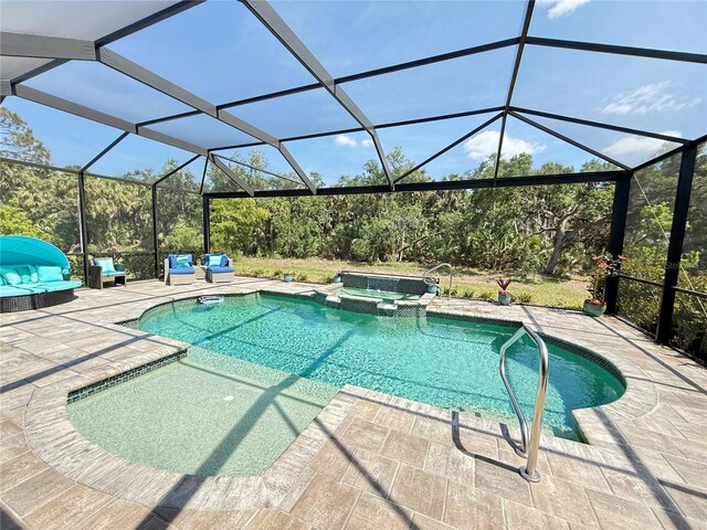 10179 Milky Way Cir, Sarasota, FL 34241 - view of pool featuring a patio and a pool with connected hot tub
