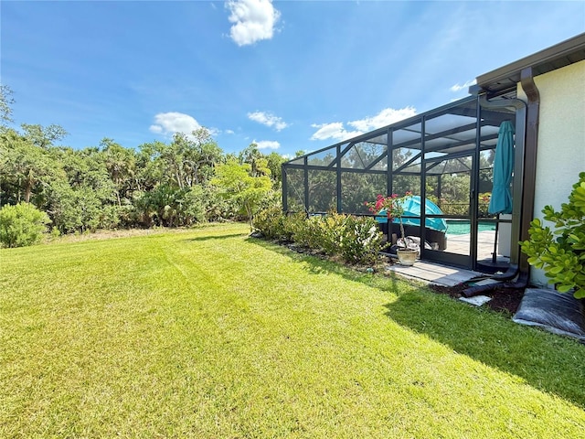 10179 Milky Way Cir, Sarasota, FL 34241 - view of grassy yard featuring an outdoor pool and a lanai