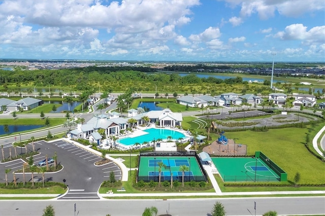 aerial view with a water view and a residential view