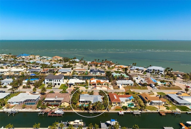 aerial view with a residential view and a water view