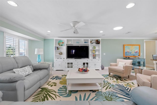 living room featuring recessed lighting, baseboards, crown molding, and ceiling fan