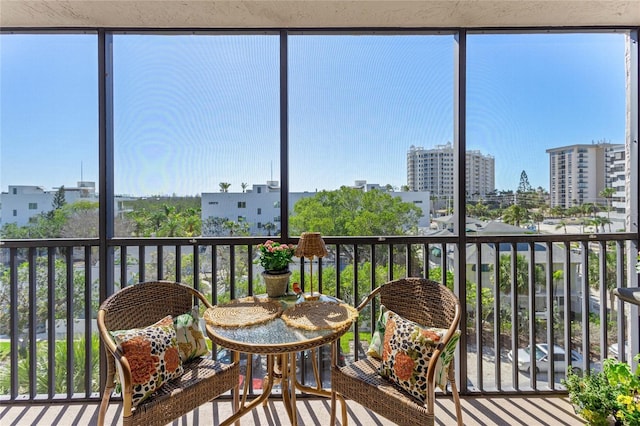 sunroom with a city view