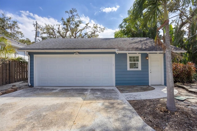 detached garage with fence